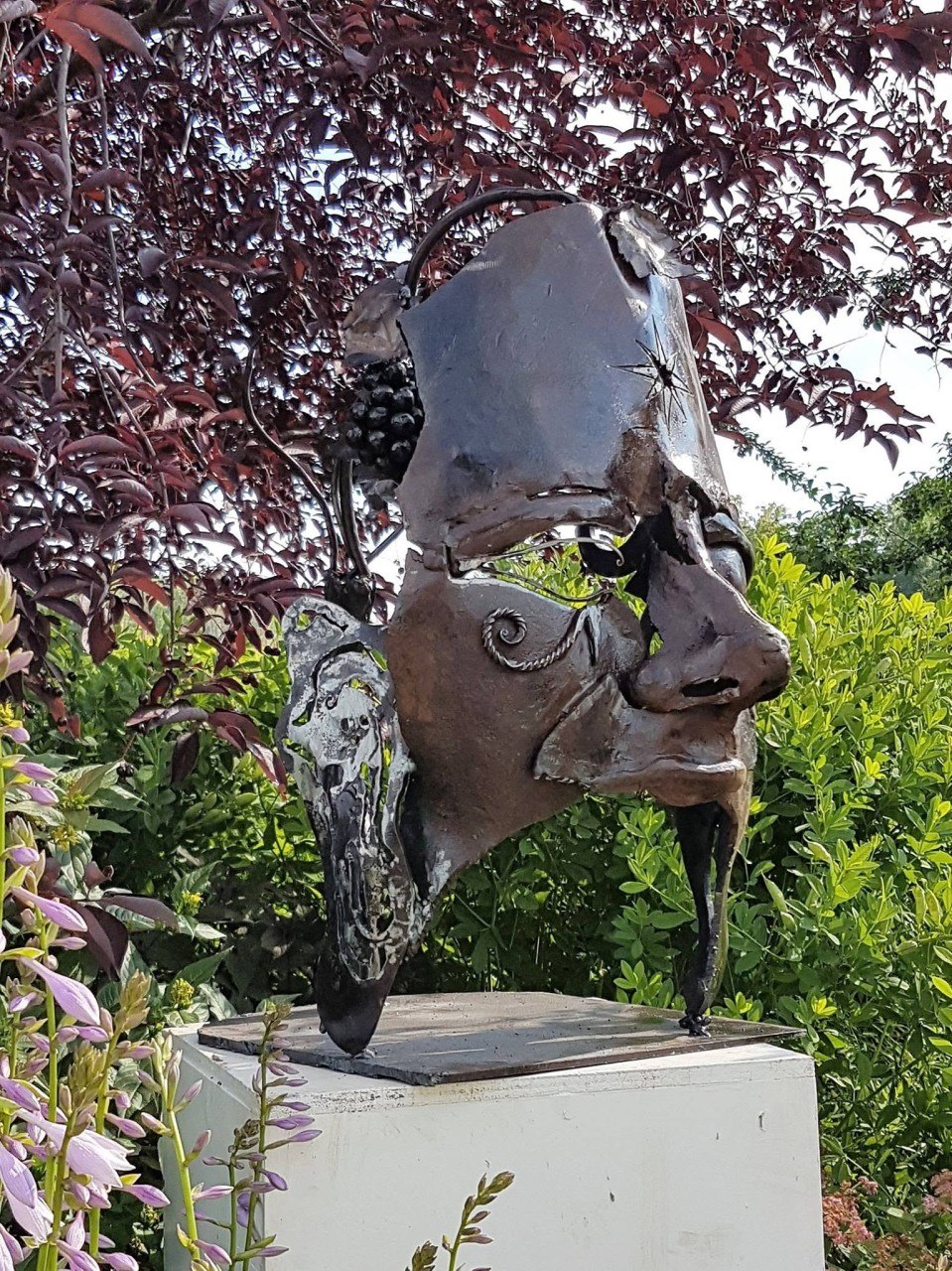 Michel Paradis — forged steel sculptural mask, outdoor installation